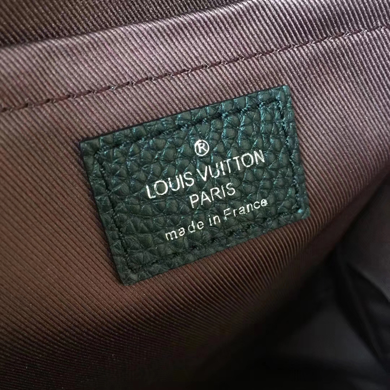 Louis Vuitton, Bags, Louis Vuitton Armand Backpack Initials Taurillon  Leather Blue